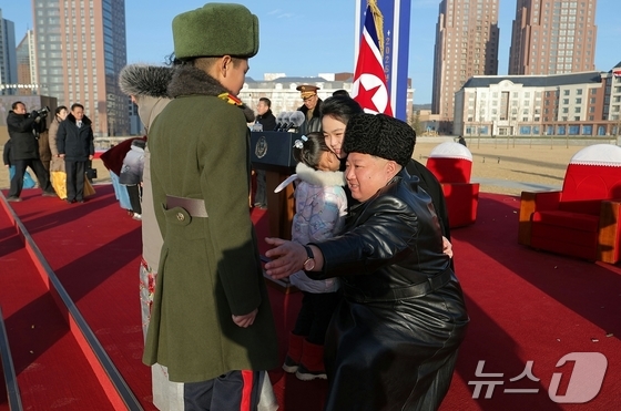 The Rodong Sinmun, the official newspaper of North Korea\'s Workers\' Party, reported on February 16 that the completion ceremony for Saebyeol Street was grandly held on February 15, with Comrade Kim Jong Un attending the ceremony. Present at the site were his daughter Ju-ae, commanders of overseas operational units, combatants and officers of engineering units, commanders of the Ministry of National Defense, and officers and soldiers from People\'s Army units at all levels / Rodong Sinmun