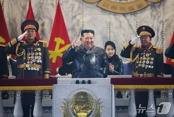 North Korea held a military parade at Kim Il-sung Square in Pyongyang on Wednesday to commemorate the closing of the 9th Workers\' Party Congress. Kim Jong Un, General Secretary of the Workers\' Party, and his daughter Ju-ae attended the event / Rodong Sinmun