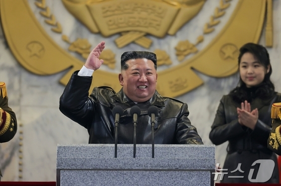 North Korea held a military parade at Kim Il Sung Square in Pyongyang on Wednesday to commemorate the closing of the 9th Workers\' Party Congress. In his speech, Kim Jong Un, General Secretary of the Workers\' Party, emphasized that our armed forces are prepared for any situation and will immediately launch a merciless retaliatory strike against any military hostile act by any force. Kim Jong Un delivering his speech, with his daughter Ju Ae visible behind him / Rodong Sinmun