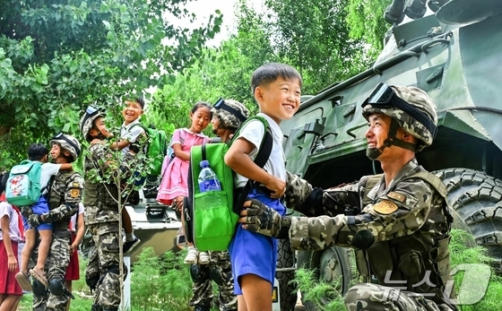 The Rodong Sinmun, the official newspaper of North Korea\'s Workers\' Party, proclaimed on February 8 that there is likely no one living on this land who has not benefited from the military. It asserted that the army has etched its mission to protect and serve the people not only in the soldiers\' oath but also through its glorious military achievements and legendary feats of valor, imbued with their noble blood and sweat / Rodong Sinmun