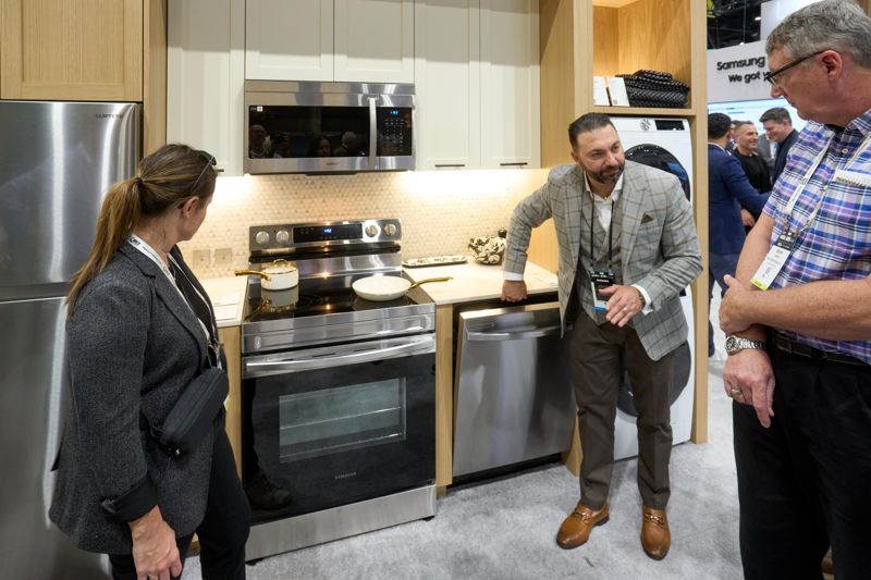 Attendees browse Samsung\'s Bespoke AI Appliances and premium built-in Dacor product line at KBIS 2026, North America\'s largest kitchen and bath industry trade show, held from February 17-19 in Orlando, Florida. / Courtesy of Samsung Electronics