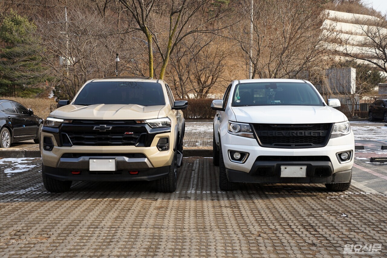 &nbsp;   Placing the old and new Colorado side by side reveals immediate differences. The new model emphasizes straight lines over curves, resulting in a sharper profile. The distinct separation between the hood, fenders, and cargo bed creates an illusion of increased size. Even when stationary, it exudes a more substantial presence than its predecessor, with angular surfaces and defined outlines lending a refined air – as if the muscular pickup is wearing a tailored suit.