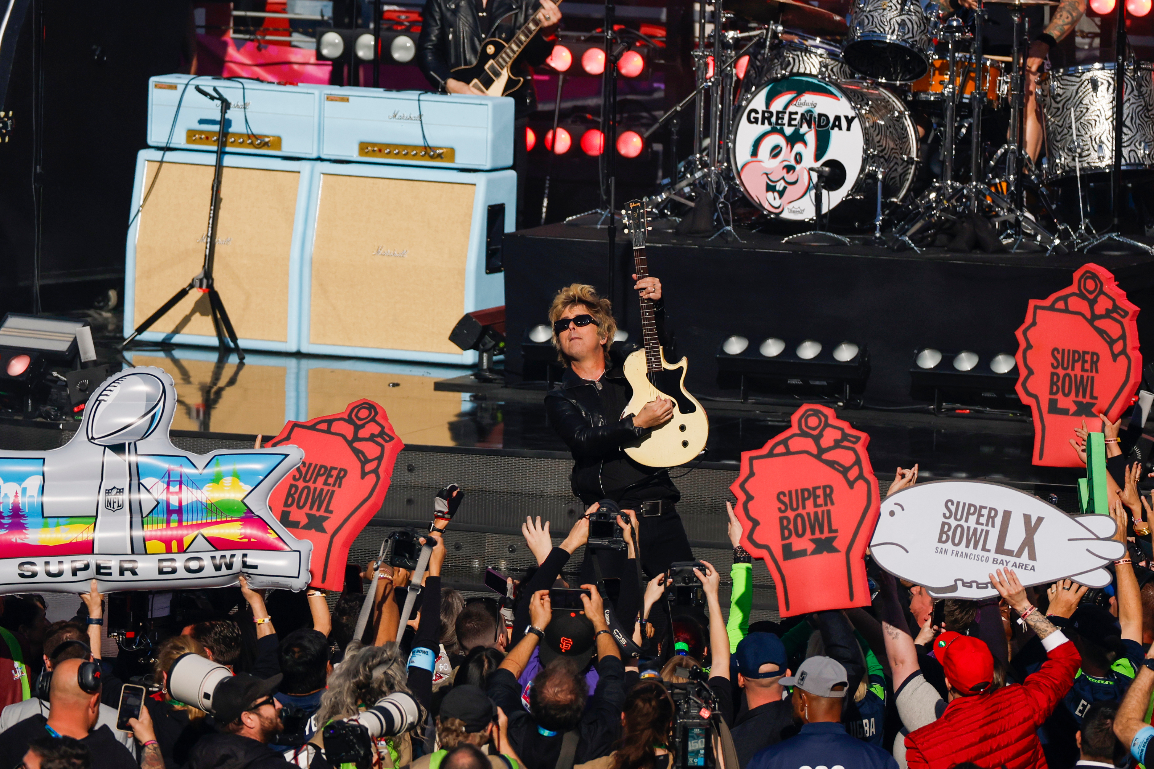 Green Day performs during the pregame at Super Bowl LX between the Seattle Seahawks and New England Patriots in Santa Clara, Calif., Sunday, Feb. 8, 2026. (Santiago Mejia/San Francisco Chronicle via AP) MANDATORY CREDIT: PHOTOGRAPHER AND SAN FRANCISCO CHRONICLE; SAN JOSE MERCURY NEWS OUT; EAST BAY TIMES OUT; MARIN INDEPENDENT JOURNAL OUT; SAN FRANCISCO EXAMINER OUT