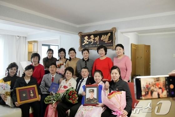 The Rodong Sinmun, the official newspaper of North Korea’s Workers’ Party, reported on March 14 that a housewarming ceremony had begun in Saebyul Street. The newspaper reported that Prime Minister Pak Thae-song, Party and government officials, commanders of People’s Army units that participated in the construction, Pyongyang City officials, and civilian and military construction workers welcomed the bereaved families of war veterans who were set to move into the new homes / Rodong Sinmun