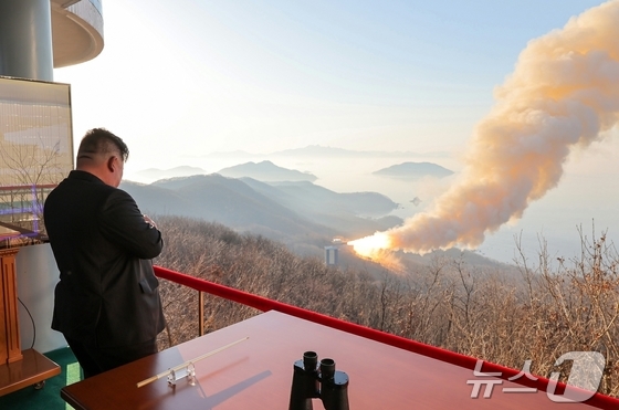 Kim Jong Un, General Secretary of the Workers\' Party of Korea, observing a test of a new solid-fuel engine / Rodong Sinmun