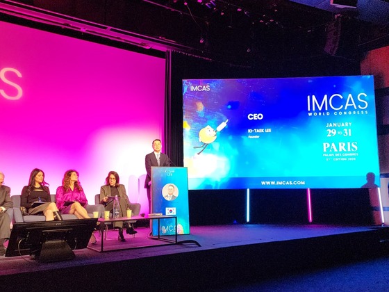 Lee Ki-taek, CEO of AMIPHARM, is delivering a presentation at IMCAS 2026 held in Paris, France on January 31 / Provided by AMIPHARM