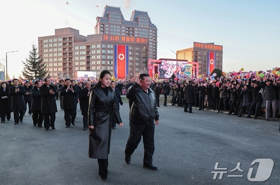 Kim Jong Un, General Secretary of the Workers\' Party of Korea, and his daughter Ju Ae attending the completion ceremony for 10,000 residential units in Phase 4 of the Hwasong District on February 16, 2026 / Rodong Sinmun