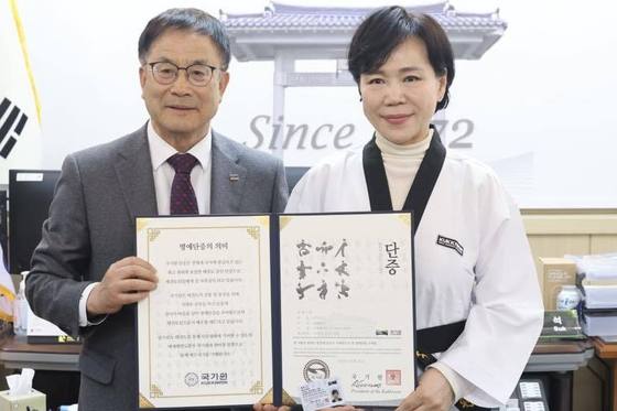 Ex-Democratic Lawmaker Receives Honorary 7th Dan in Taekwondo: What It Means for Her Political Future
