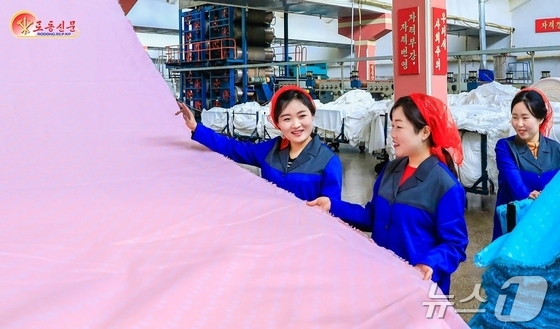 The Rodong Sinmun, the official newspaper of North Korea\'s Workers\' Party, reported on March 8 that women are present at every front of the nation-building effort in celebration of International Women\'s Day / Rodong Sinmun