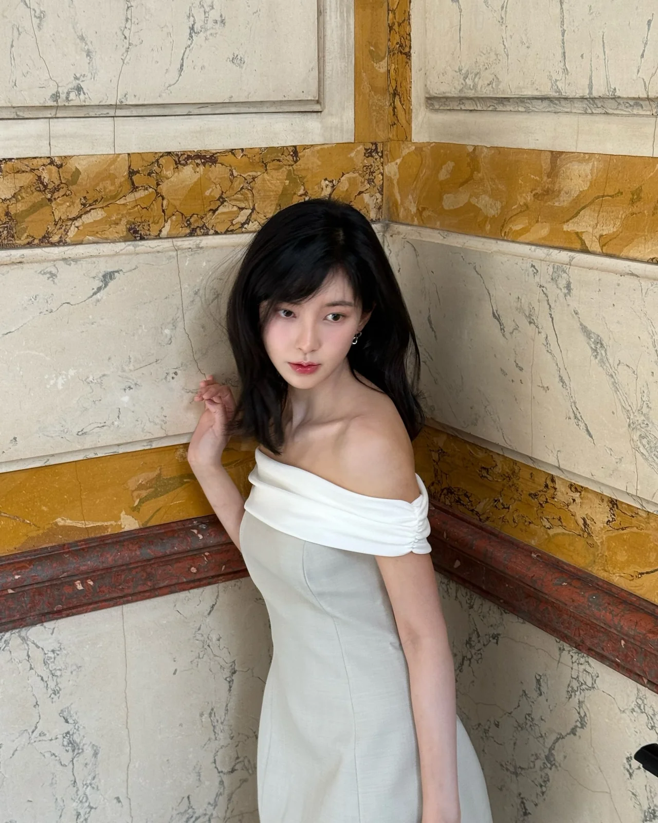 Off-shoulder mini dress | Beige-tone dress with white banding detail that highlights a delicate shoulder line