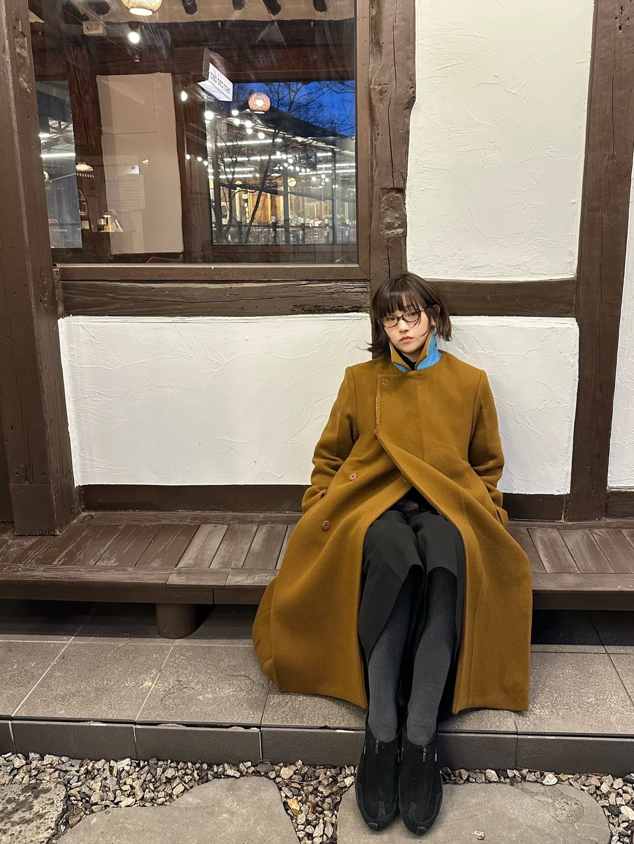 Black innerwear and tights | An all-black base that highlights the coat\'s color /photo=Park So-dam\'s Instagram