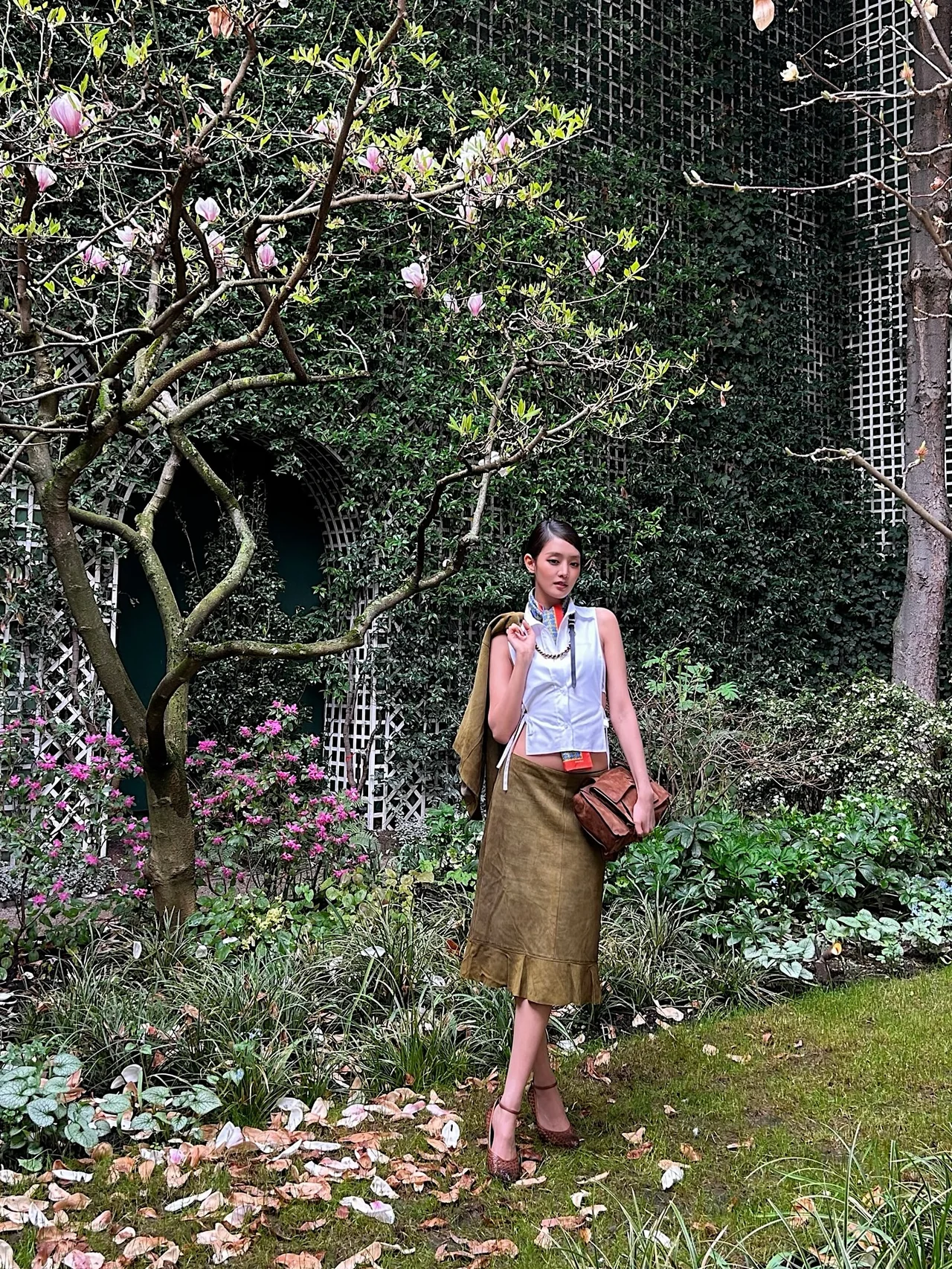 Suede midi skirt | A seductive silhouette crafted from heavy material with ruffle detailing.