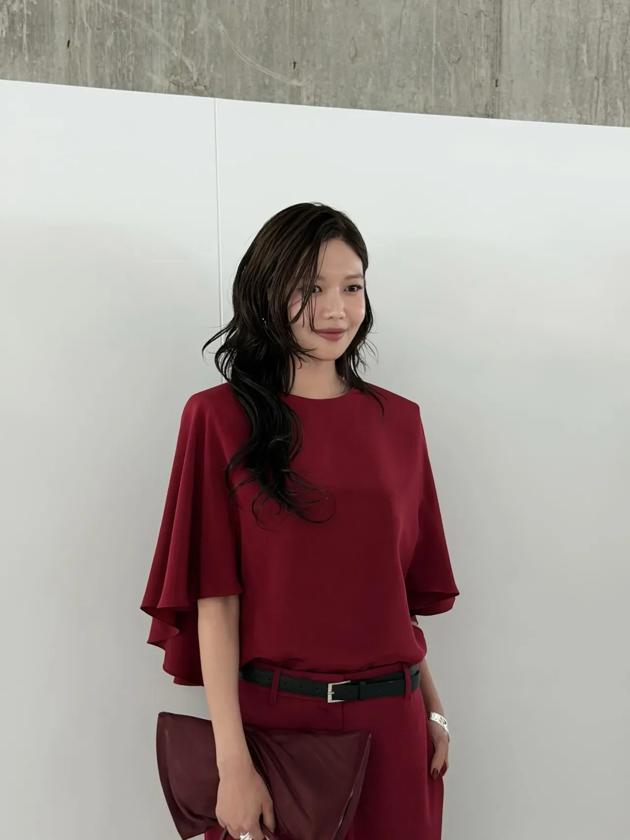 Why Suyeon’s Burgundy Monochrome Outfit is the Ultimate Style Statement for 2026