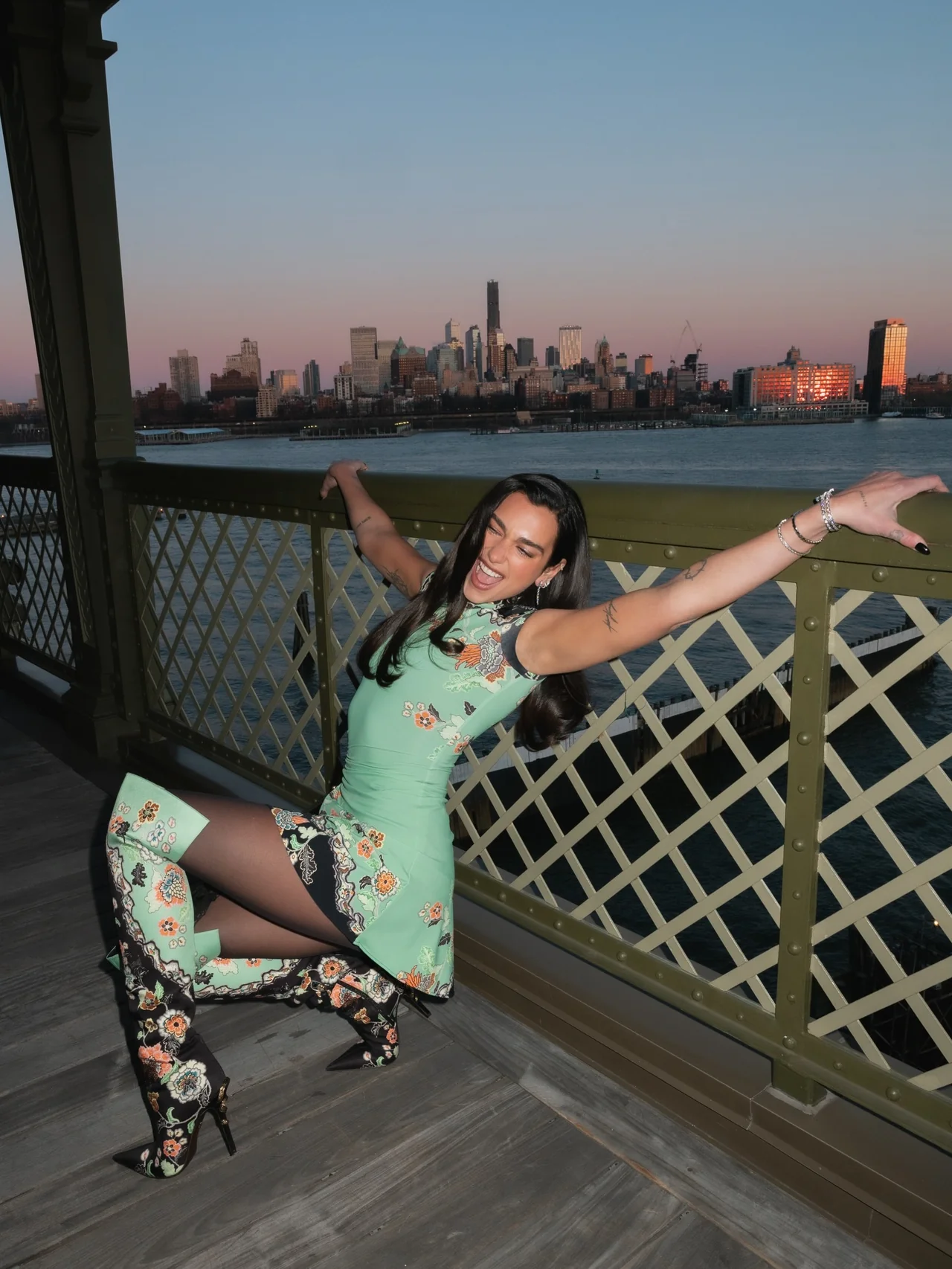 &nbsp;     Floral-pattern thigh-high boots | Kitsch charm styled with a mint mini dress and ornate embroidered boots /Photo=Dua Lipa Instagram
