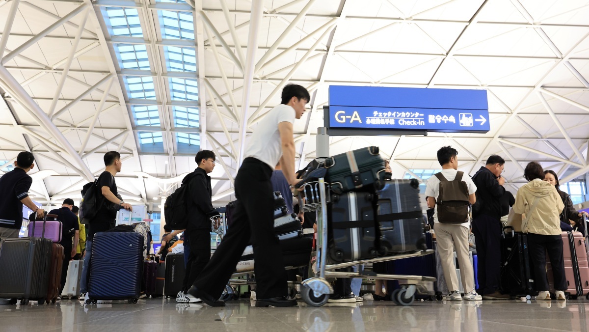 Travelers move through the departure hall of Incheon International Airport Terminal 1. / News1