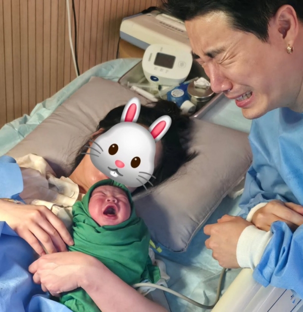 San E Welcomes Second Child: Emotional Family Moments Shared on Social Media