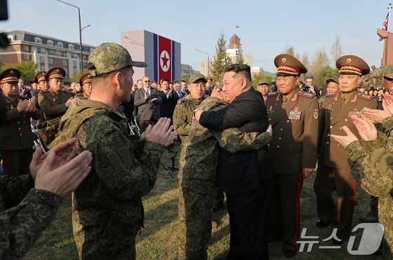 North Korean leader Kim Jong Un embraces and consoles troops dispatched to Russia during a ceremony marking the completion of the “Overseas Military Operations Combat Feats Memorial Hall” in Pyongyang on April 26 local time. [For Use Only in the Republic of Korea. Redistribution Prohibited] / Courtesy of News1
