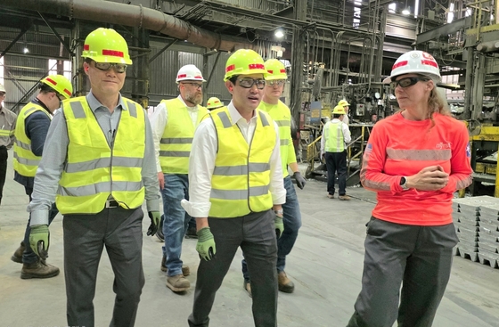 Choi Yoon-beom, Chairman of Korea Zinc (center front row), is touring the smelter facilities alongside local employees in the U.S. / Provided by Korea Zinc