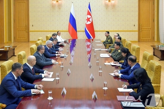 On Wednesday, the Rodong Sinmun, the official newspaper of the Workers\' Party, reported that Social Security Minister Bang Du-seop and Russian Interior Minister Vladimir Kolokoltsev held talks at the Pyongyang Assembly Hall on the previous day / Rodong Sinmun