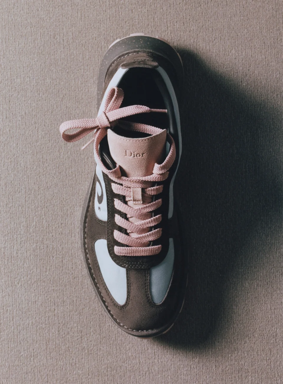 /Photo: Dior\'s \'Dior Squash\' sneaker blends couture polish with athletic energy.