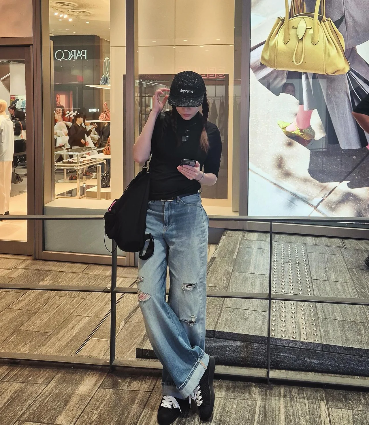 Unlock Your Style: How to Master the Chic Black Top and Wide Denim Look
