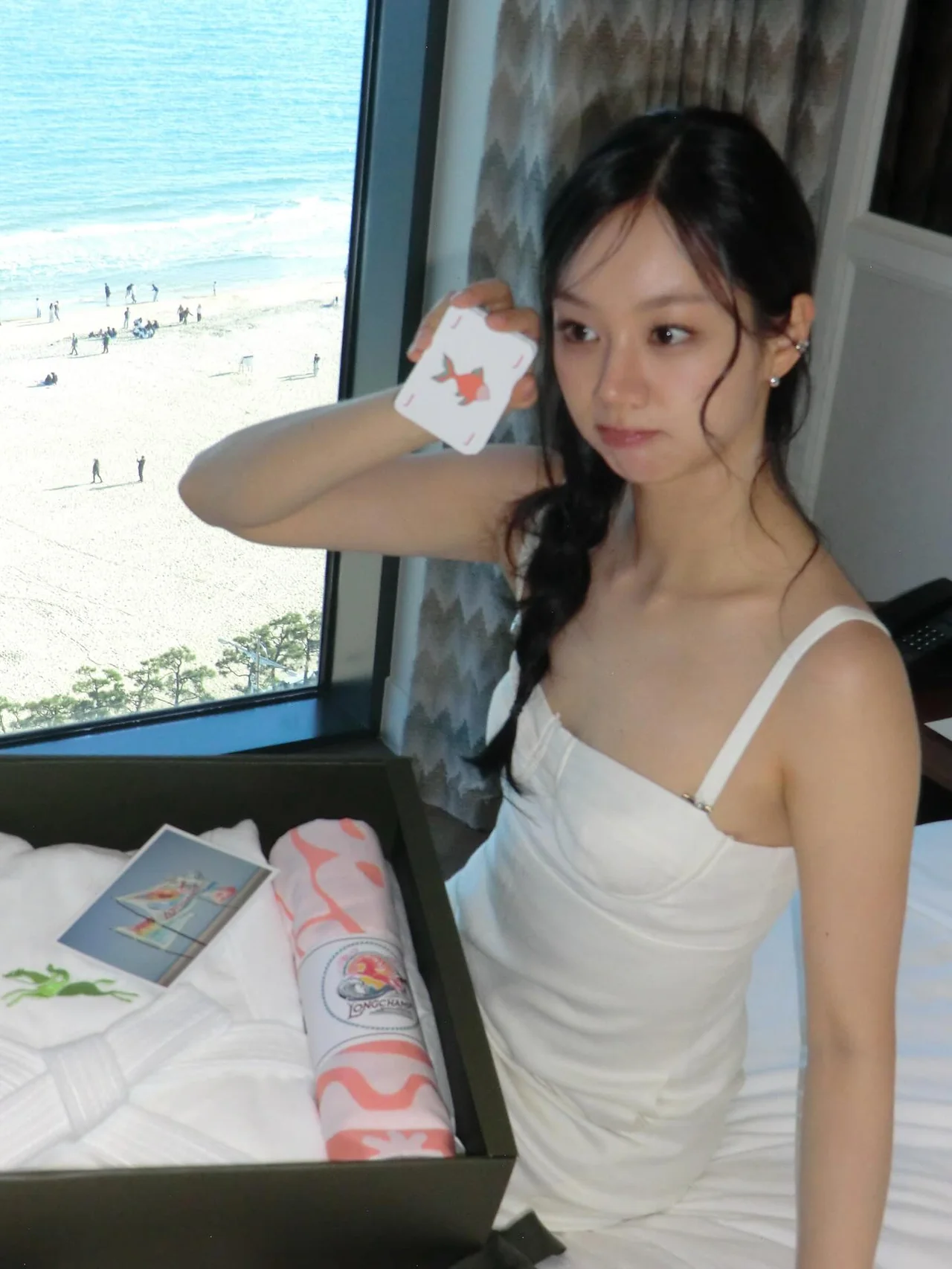 Spring Travel Must-Have: How to Style a White Slip Dress for Beach Getaways