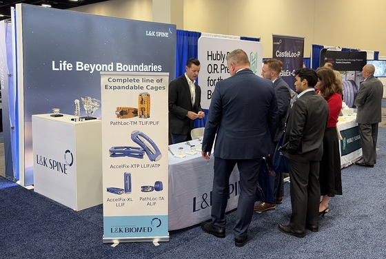 L&K Spine explaining its products to attendees at the AANS conference / Provided by L&K Biomed
