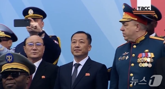 North Korean officials are seen in the stands during Russia’s Victory Day military parade on May 9. On the left is Shin Hong Chol. The official on the right has not been formally identified but is believed to possibly be O Chol Jin, deputy director of the Europe 1 Bureau at North Korea’s foreign ministry. / Courtesy of Russian state media outlet TASS’ X account