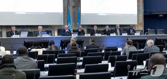 A scene from the 2026 ITU-T SG11 Closing Plenary Session, where discussions are underway regarding the adoption of an international standard for AI policy intelligence in public decision-making (Provided by ETRI) 2026.5.6 / News1