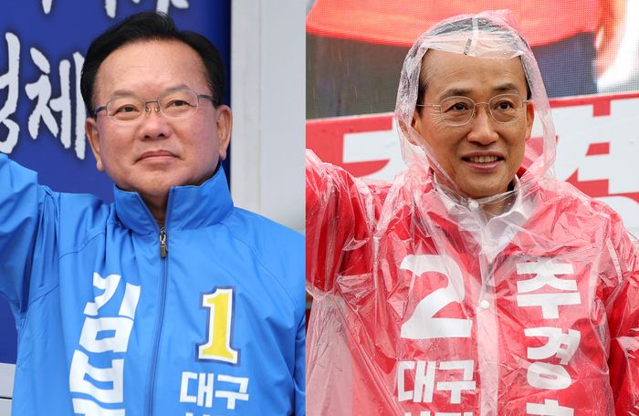 김부겸(왼쪽) 더불어민주당 대구시장 후보가 27일 오전 대구 북구 태전네거리에서, 추경호 국민의힘 대구시장 후보가 대구 북구 팔달교에서 각각 출근길 시민들에게 지지를 호소하며 인사하고 있다. ⓒ 뉴시스