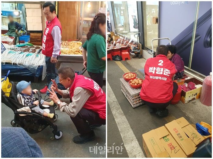 박형준 국민의힘 부산시장 후보가 26일 부산 사상구 덕포시장에서 시민들과 인사를 나누고 있다. ⓒ데일리안 김민석 기자