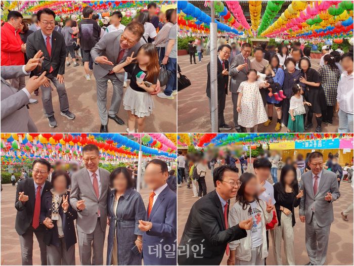 박형준 국민의힘 부산시장 후보와 곽규택 국민의힘 의원이 24일 부산 서구에 위치한 내원정사에서 시민들과 기념촬영을 하고 있다. ⓒ데일리안 김민석 기자