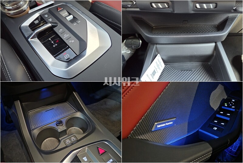 BMW M235 x드라이브 그란쿠페 1열 주요 조작부 및 수납공간. 컵홀더 앞쪽에 위치한 스마트폰 무선충전 패드는 스마트폰 충전이 빠르게 되면서도 발열이 거의 발생하지 않아 만족도가 높다. / 가평=제갈민 기자